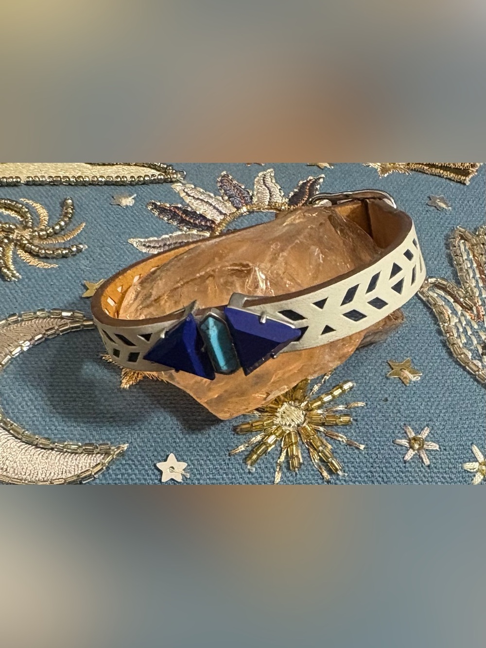 White Cutout Leather Bracelet with Blue Gem Accent